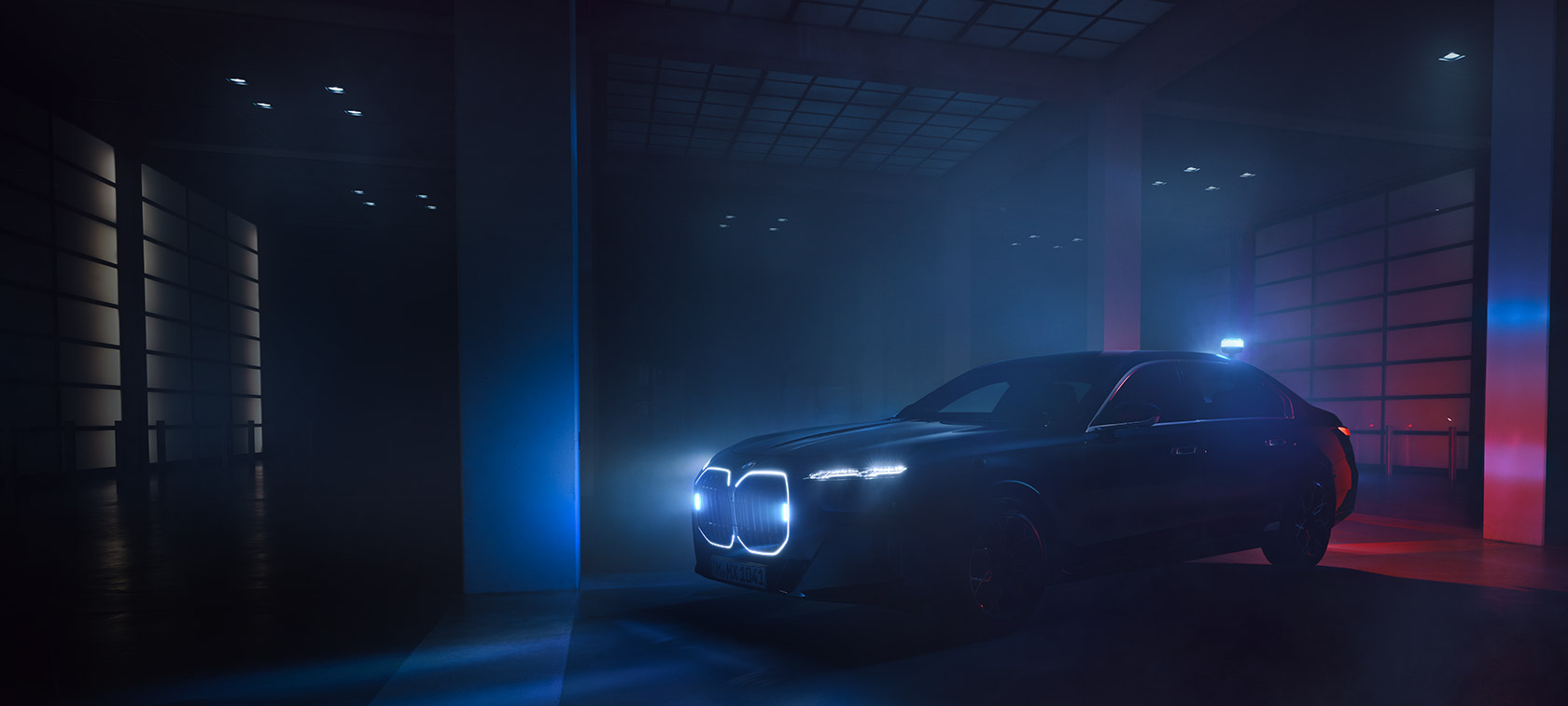 BMW 7 Protection G73 sa signalnim svetlima u mraku 1/3 bočni prikaz